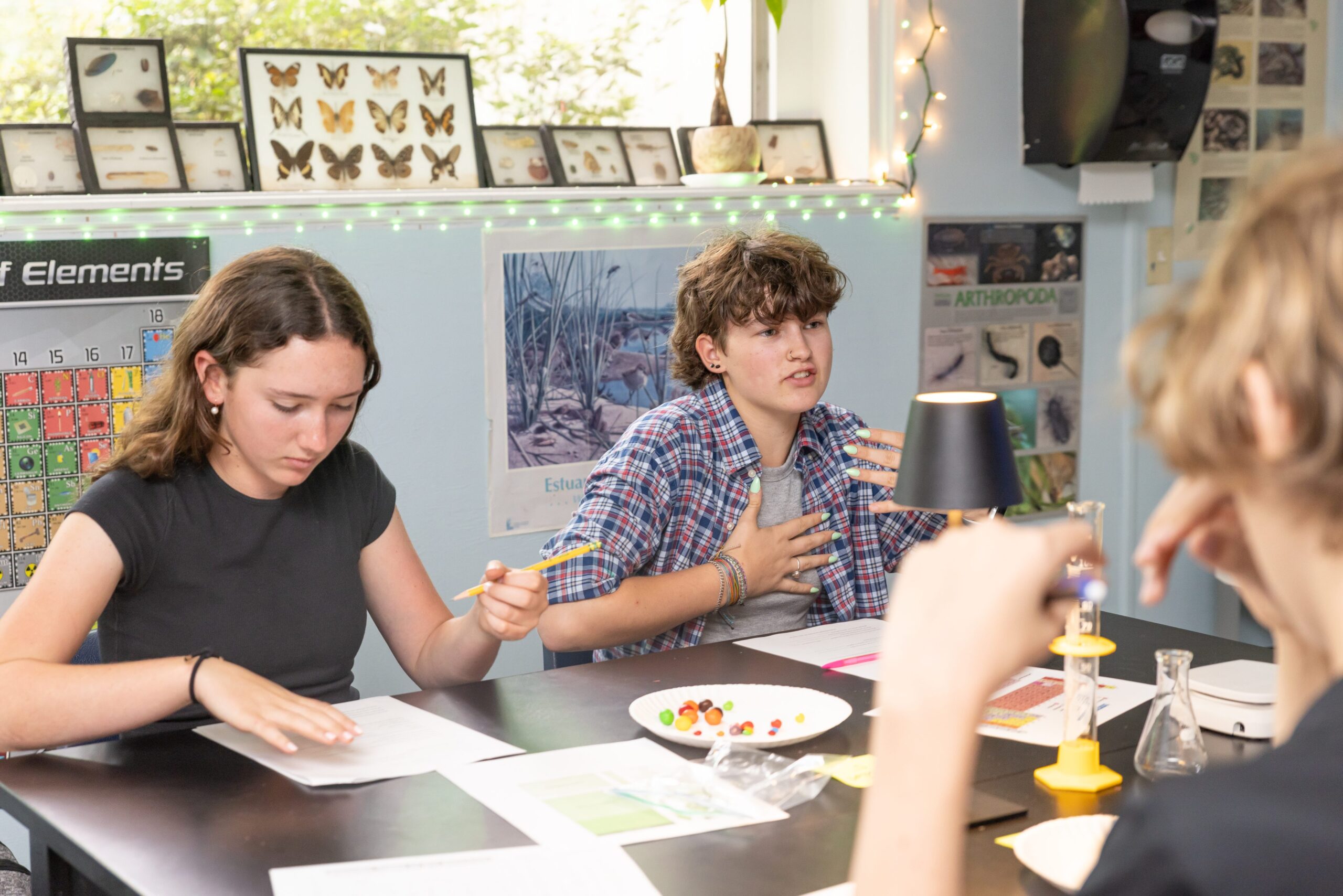 Students in a classroom having a discussion.