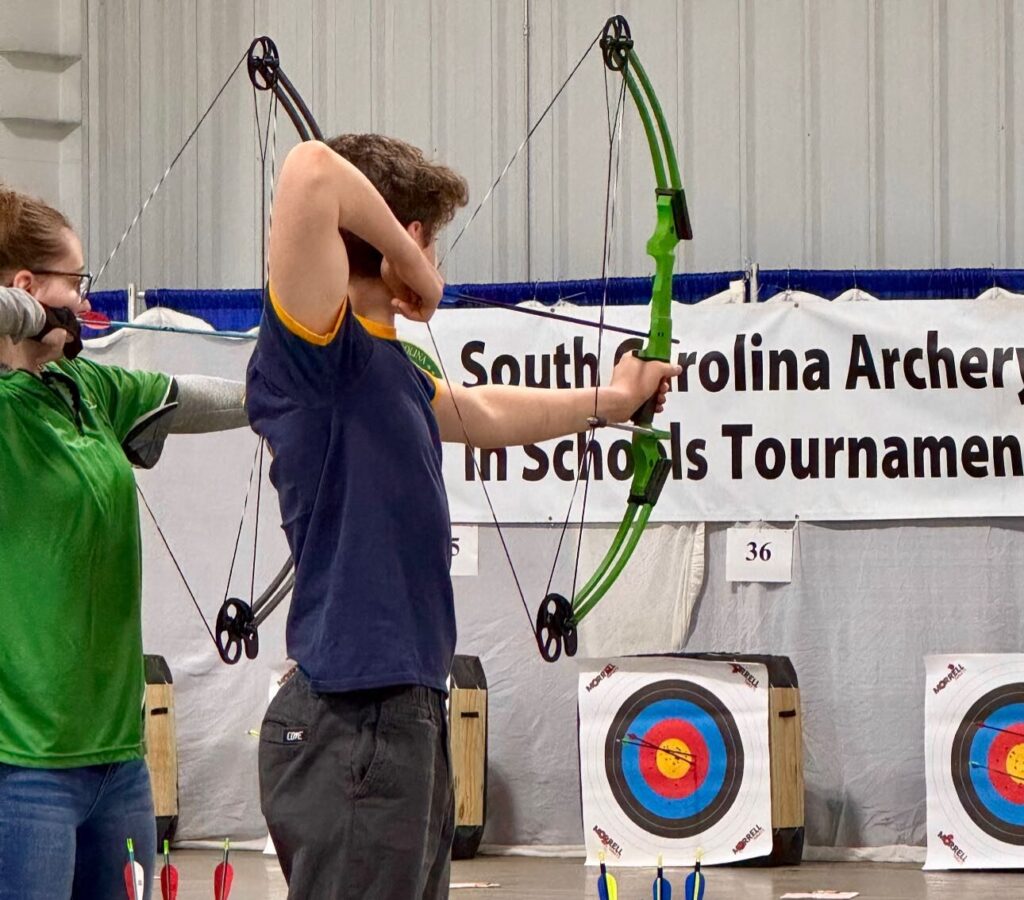 Charleston Collegiate student competes in the SC Archery State Bullseye Championship.