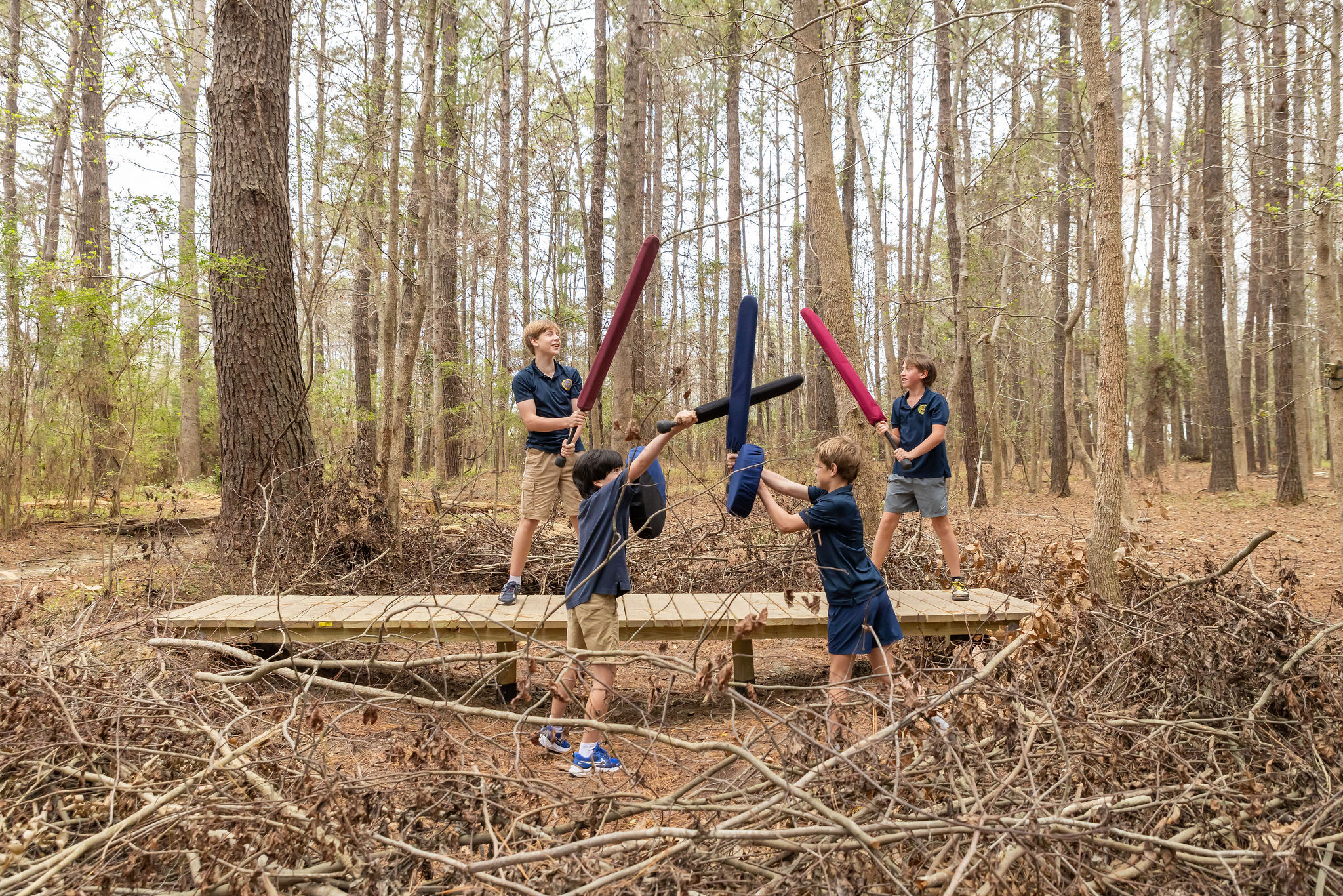 Students larping in outdoor leadership.