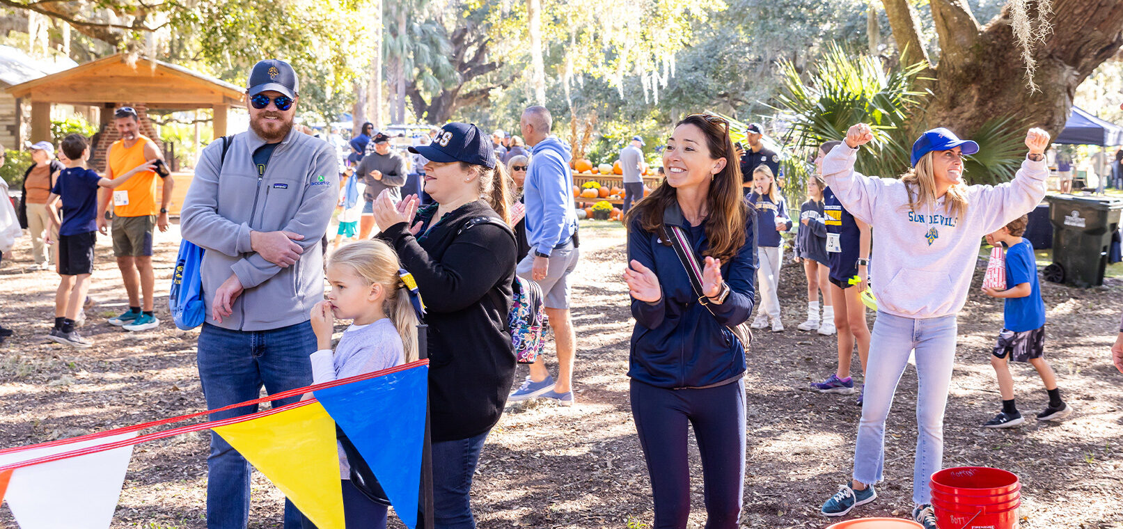 Students, parents, and faculty having fun on campus.
