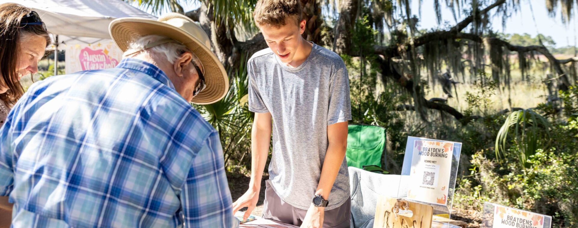 student entrepreneur at a fall market.