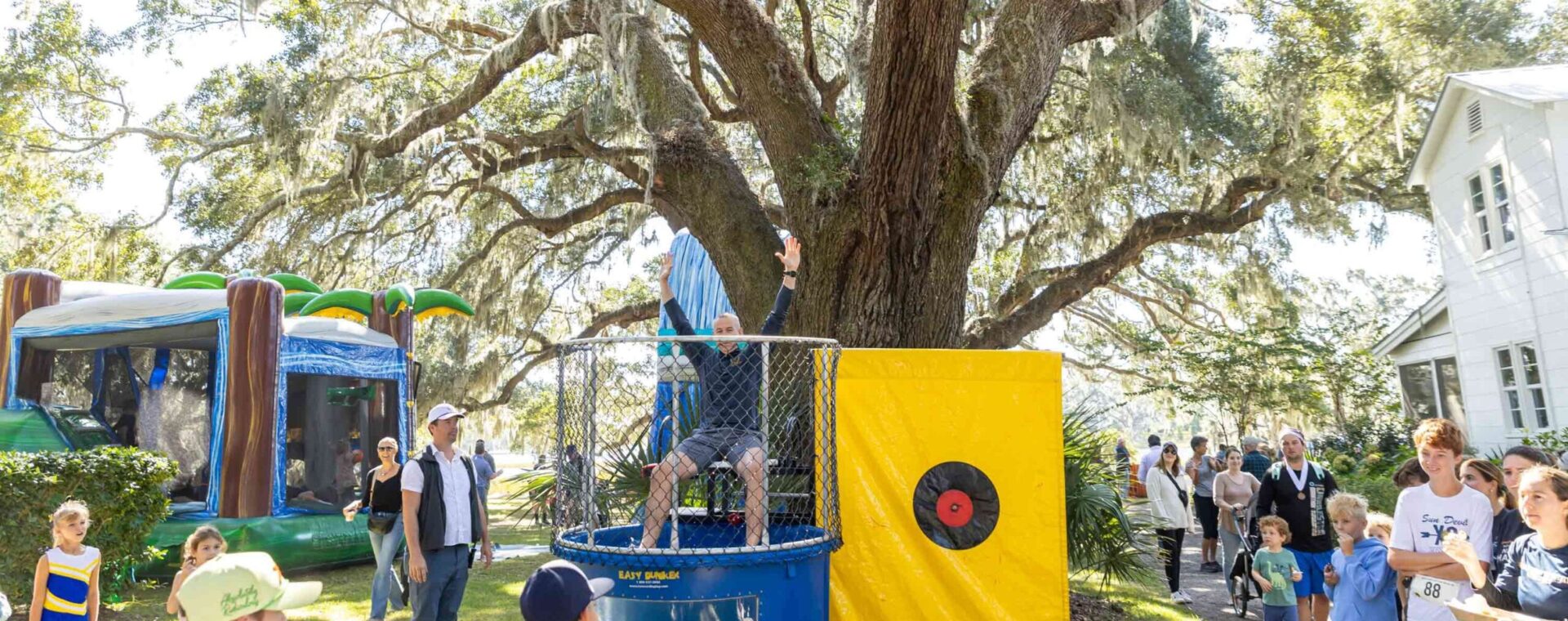 Head of School Andy Gyves in a dunk tank at our Run Like The Devil Fall Festival.