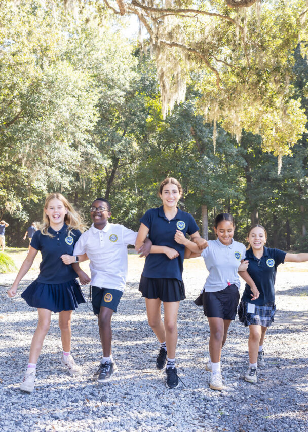 Middle school students walking through campus.